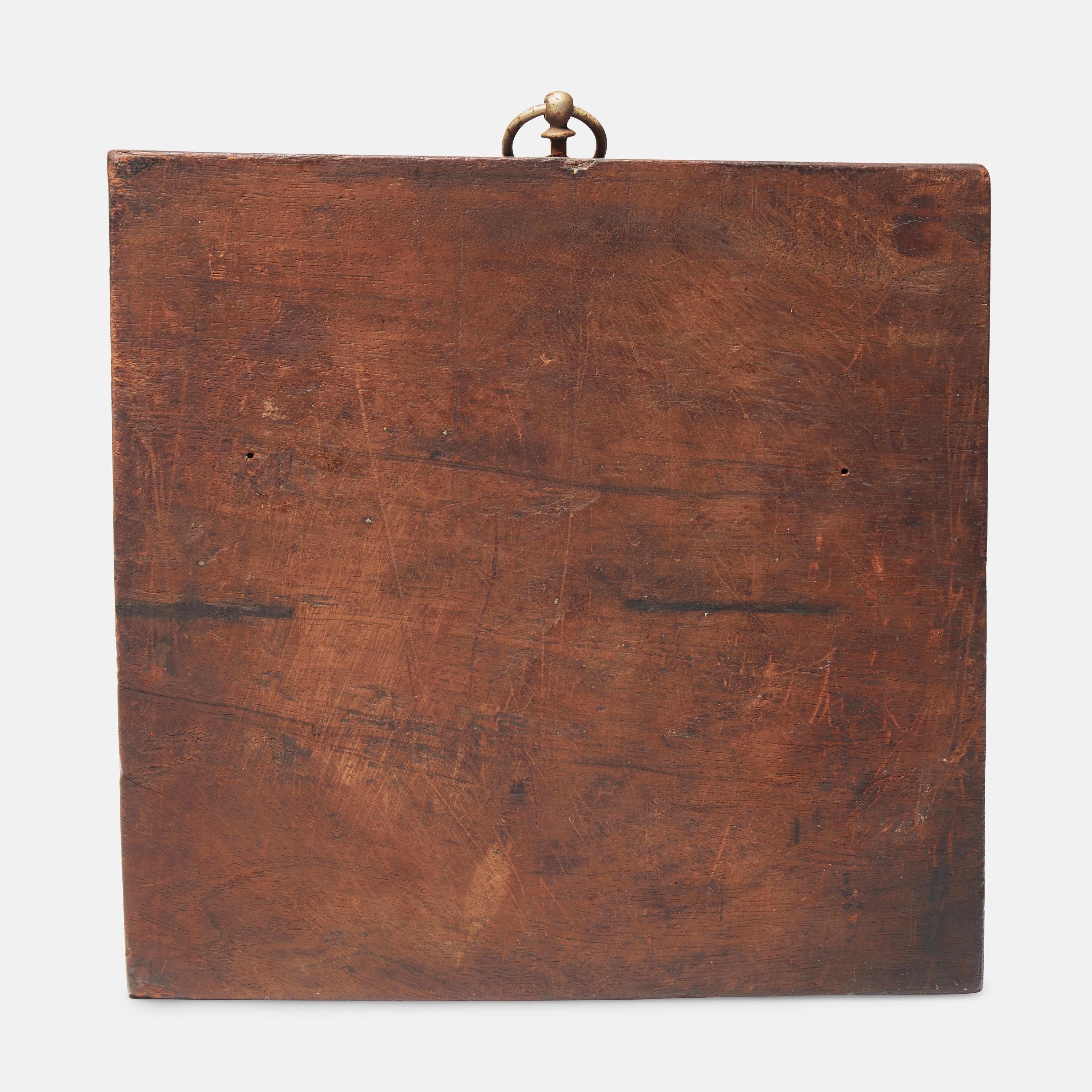 A Carved Walnut Cakeboard