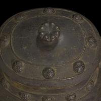 A Chinese patinated bronze archaistic vessel and cover, you 复古风格铜提梁卣