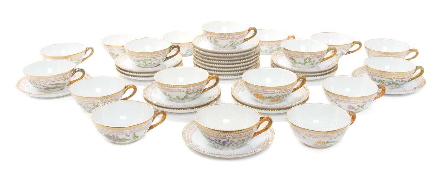 Eighteen Royal Copenhagen Flora Danica Teacups and Saucers Diameter 6 inches.