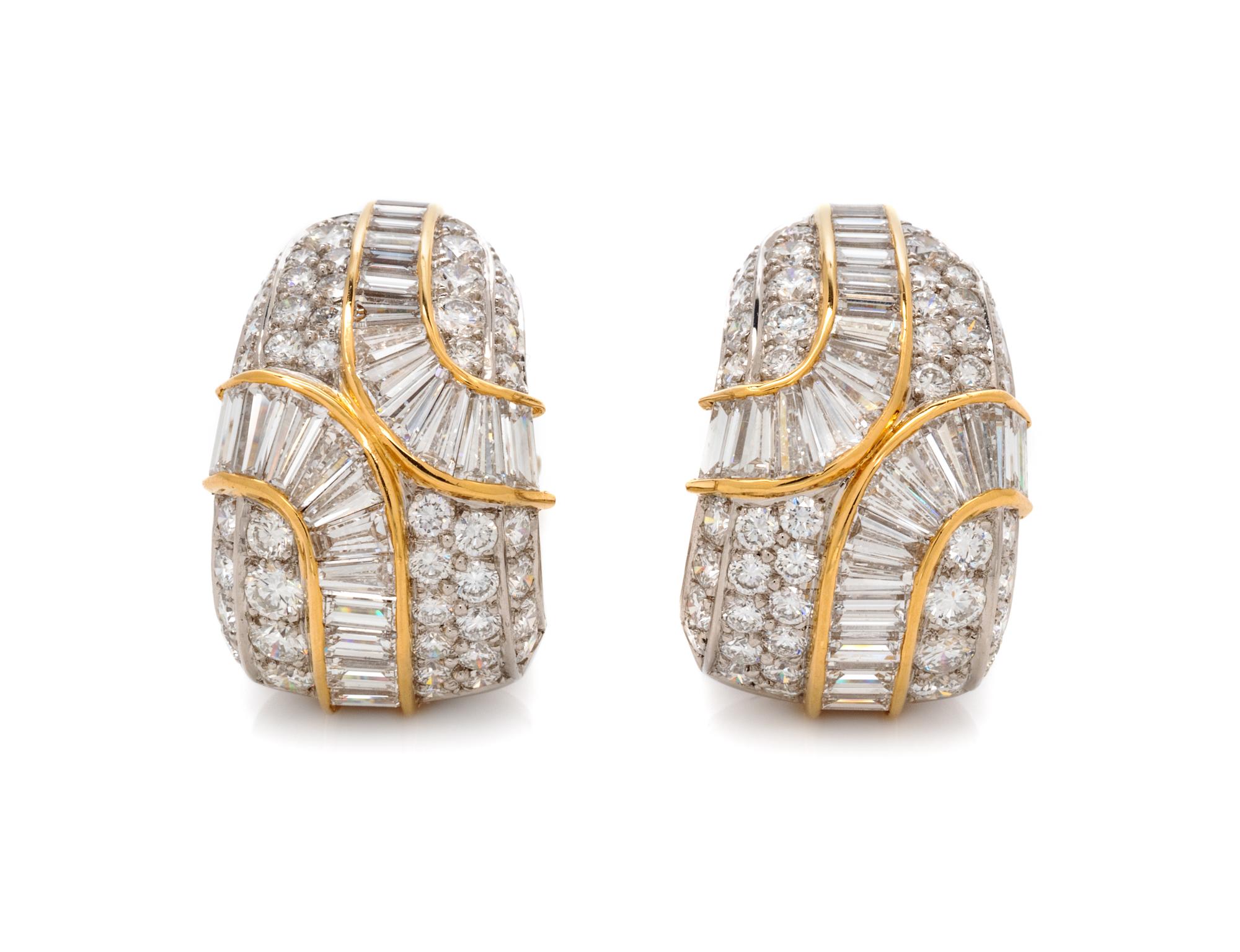 A Pair of Platinum, 18 Karat Yellow Gold and Diamond Earclips, 17.70 dwts.