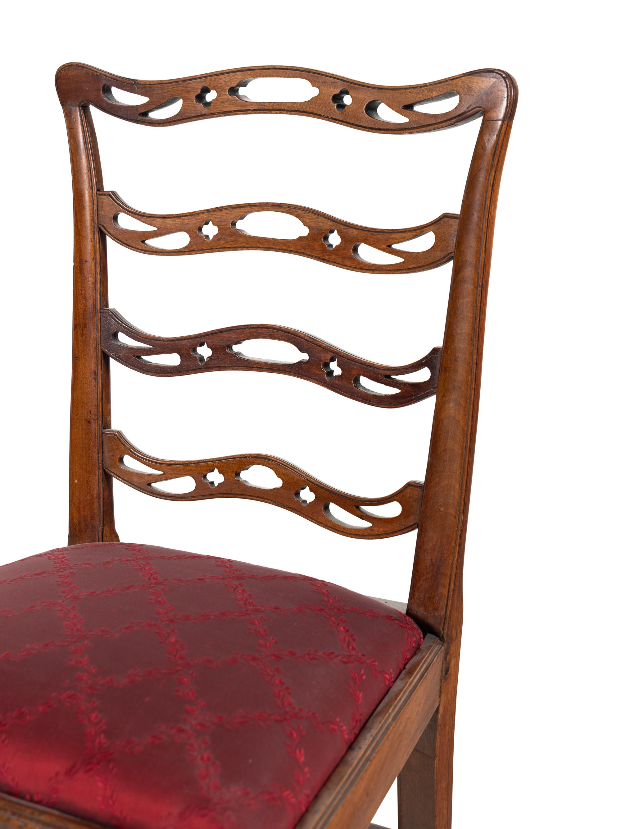 A Set of Six Federal Pierced and Carved Mahogany Dining Chairs