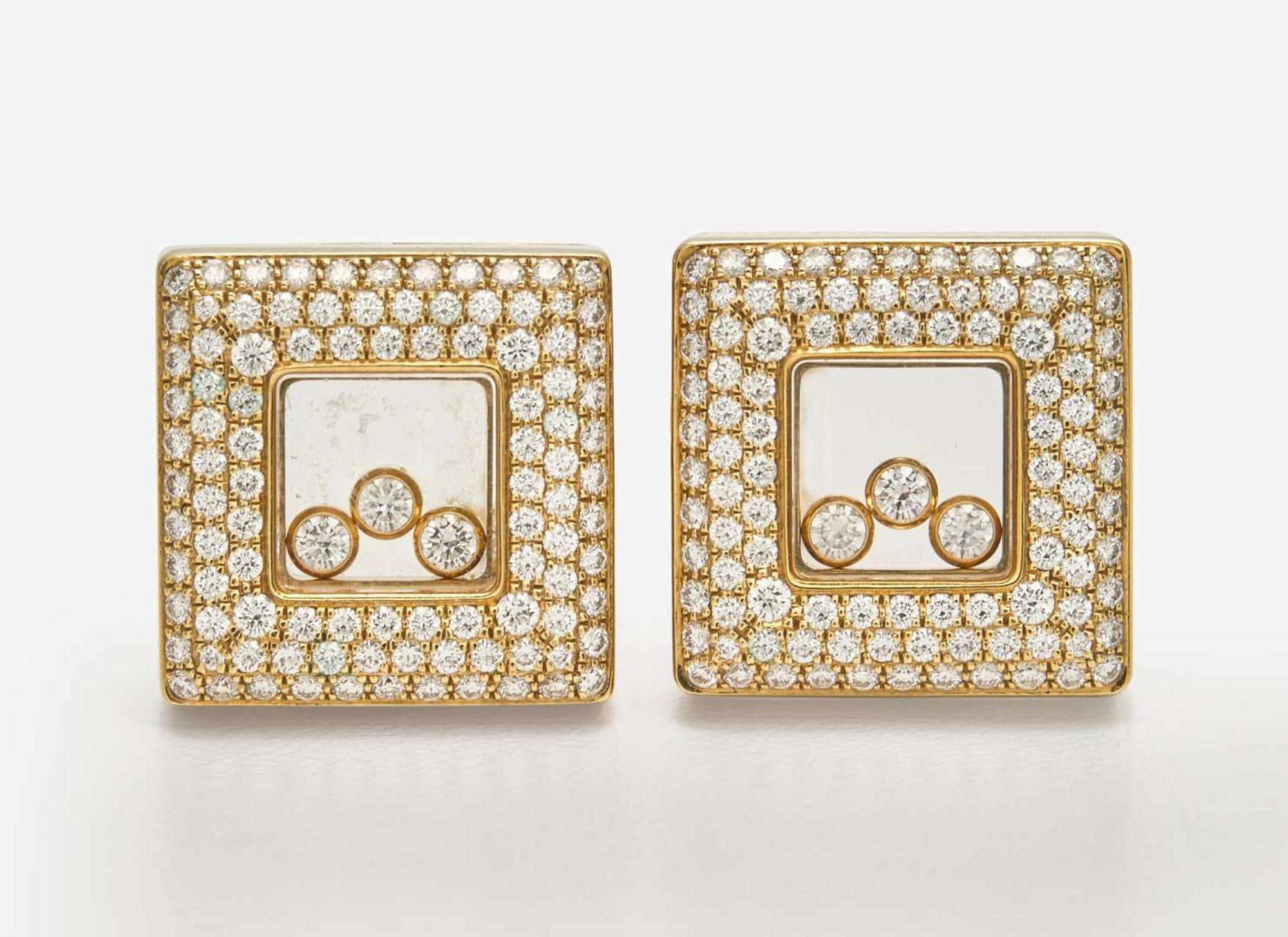 A Pair of 18K Yellow Gold Chopard Happy Diamonds Ear Clips