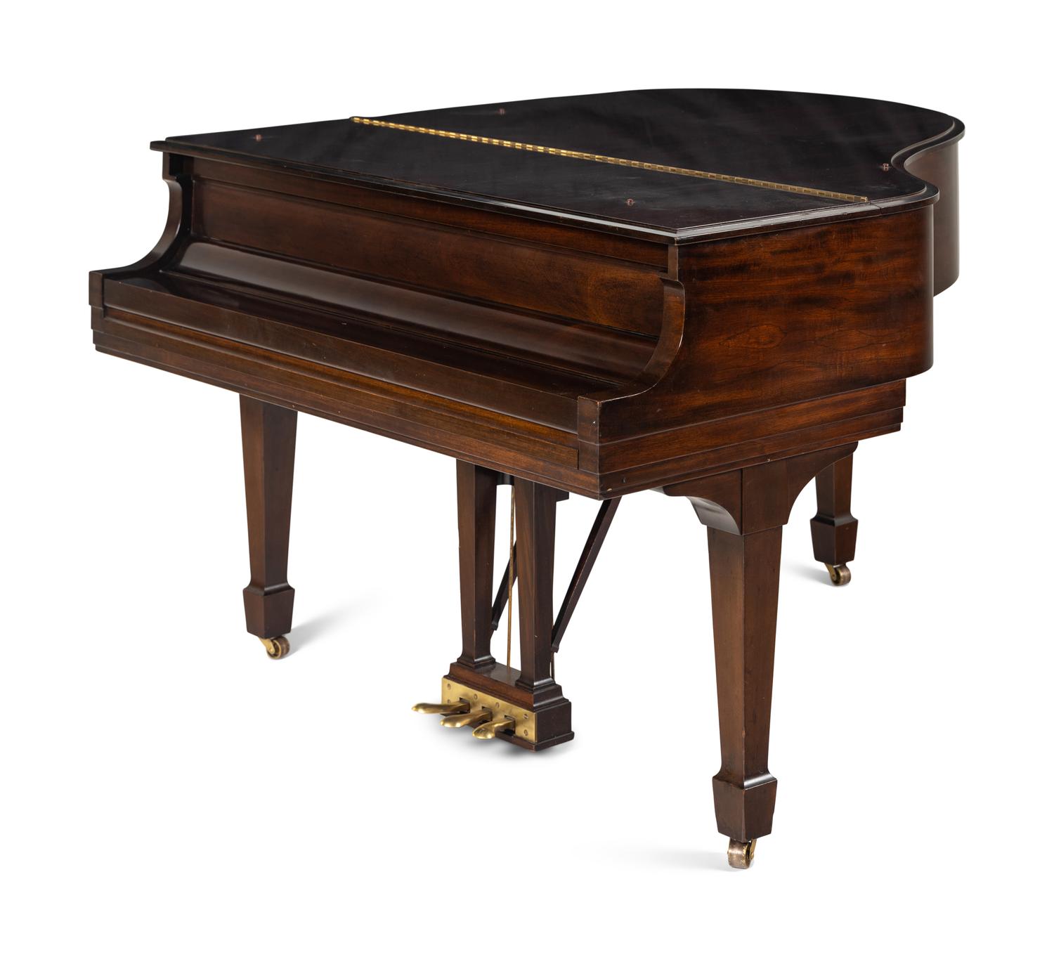 A Steinway and Sons Mahogany Baby Grand Piano