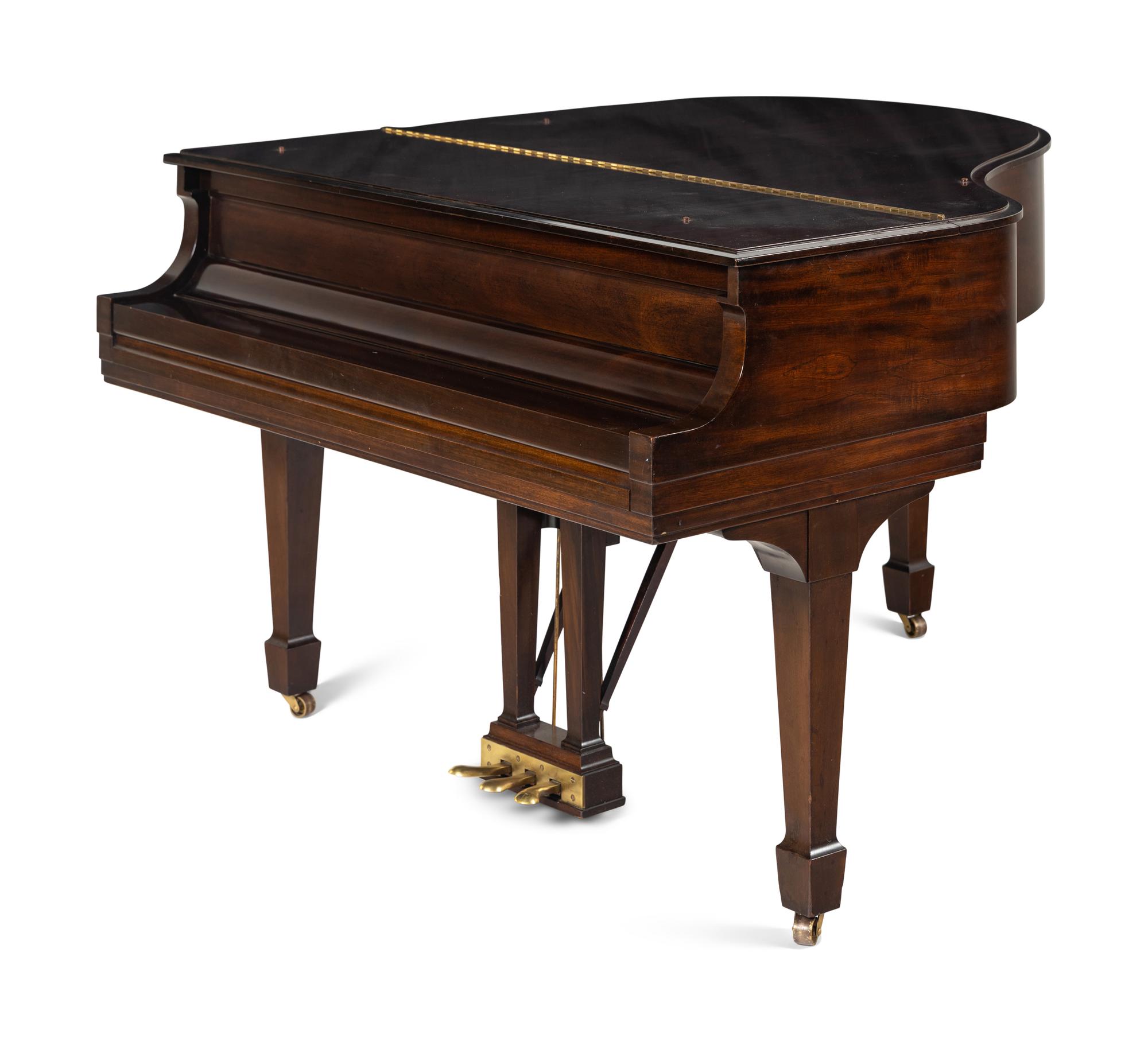 A Steinway and Sons Mahogany Baby Grand Piano