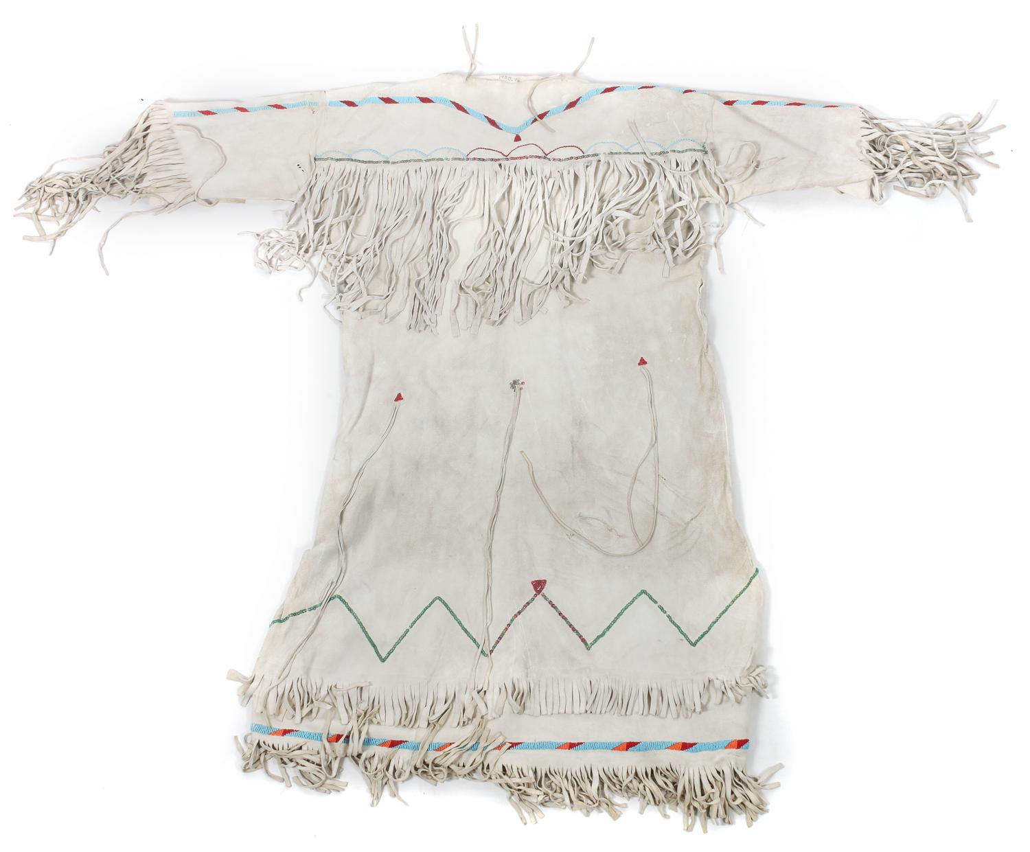 A Group of Plains/ Plateau Area Clothing Length of one dress 34 1/2 inches.