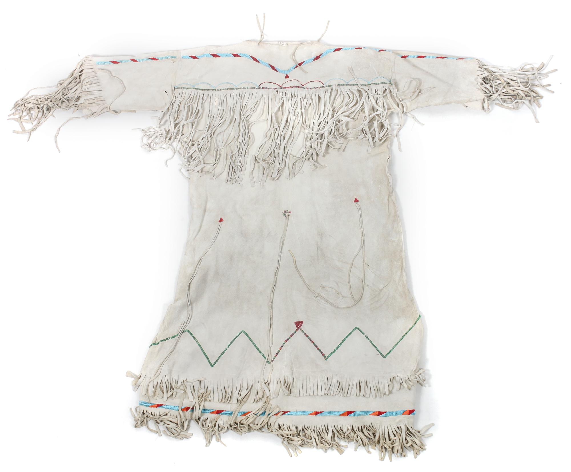 A Group of Plains/ Plateau Area Clothing Length of one dress 34 1/2 inches.