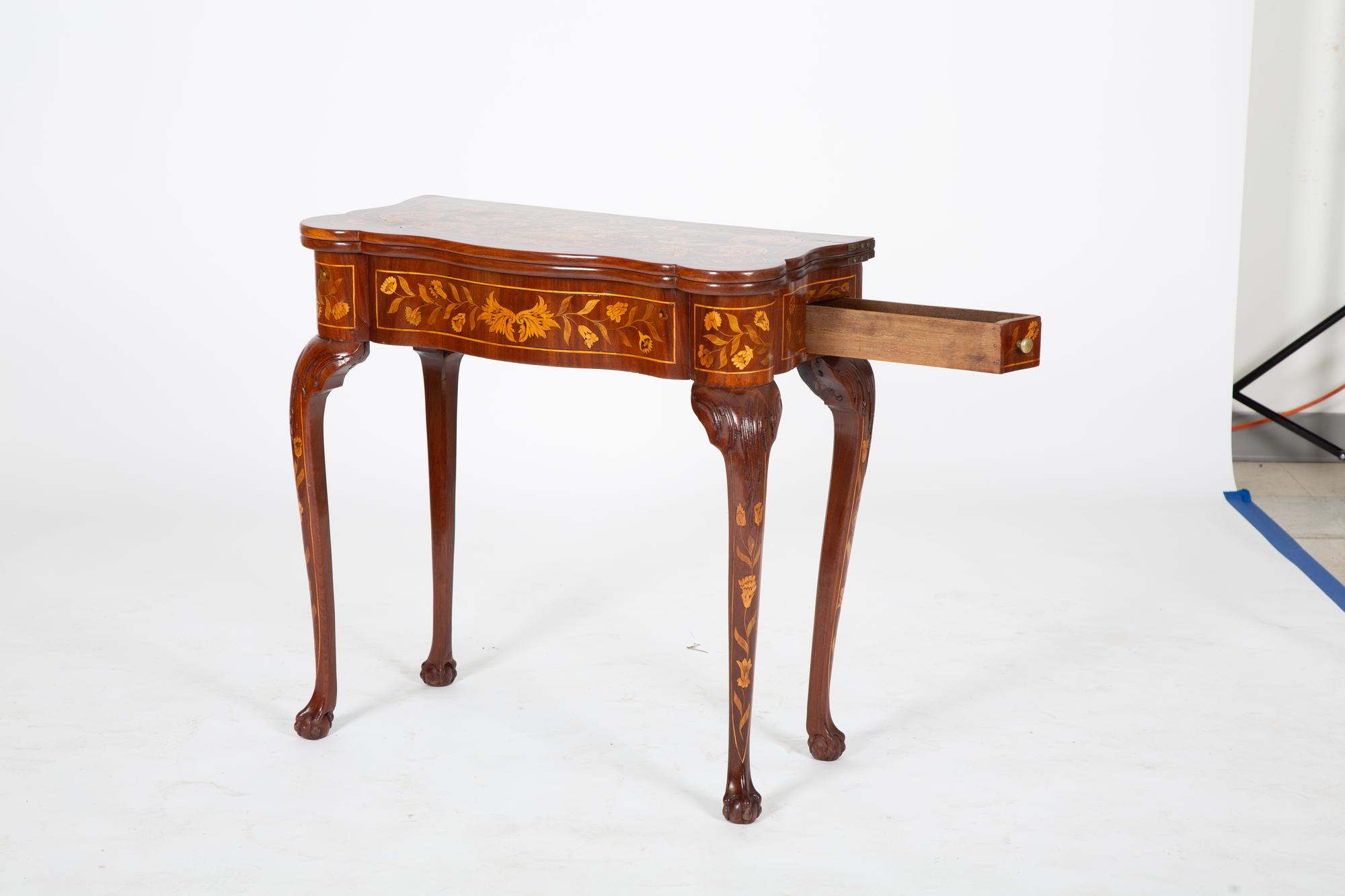 A Dutch Marquetry Flip-Top Table