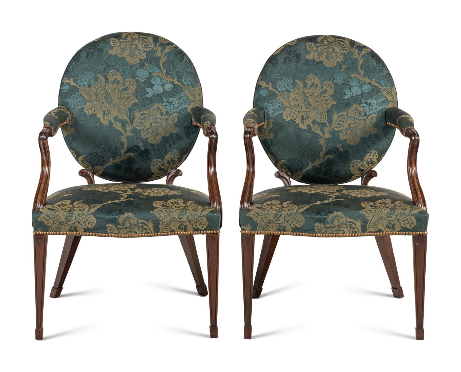 A Pair of George III Mahogany Armchairs