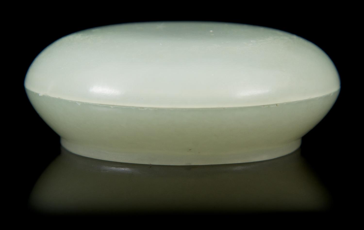 A Jade Box and Cover Diameter 2 1/8 inches.