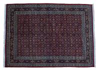 A Tabriz Wool Rug 12 feet 10 inches x 10 feet.