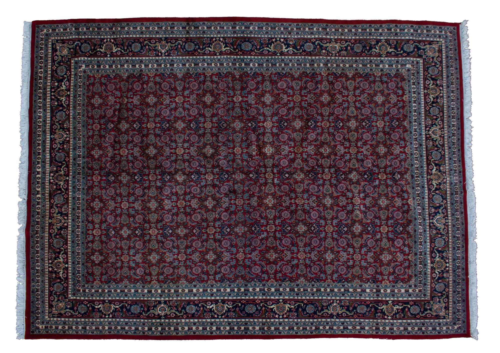 A Tabriz Wool Rug 12 feet 10 inches x 10 feet.
