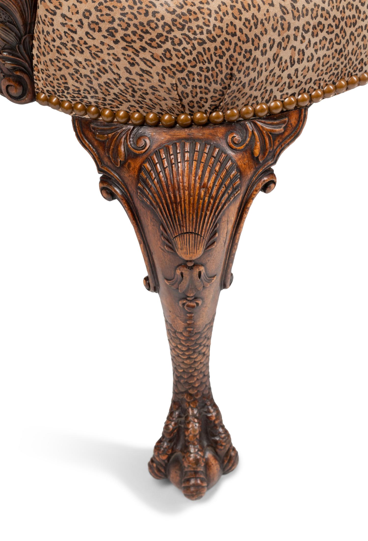 A Pair of George III Style Carved Walnut Library Armchairs
