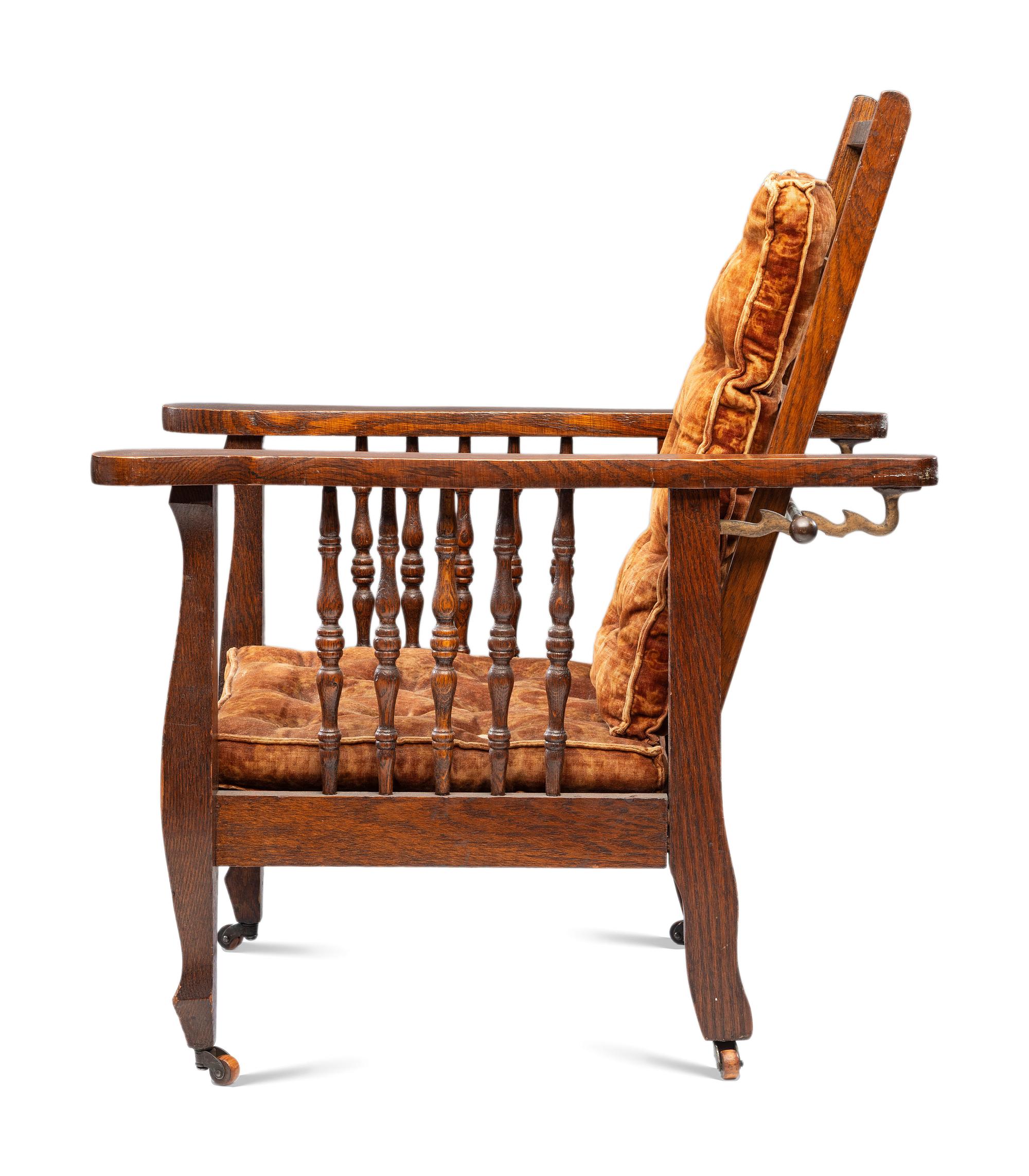 A Victorian Carved Mahogany and Tufted Velvet Upholstered Child's Reclining Armchair