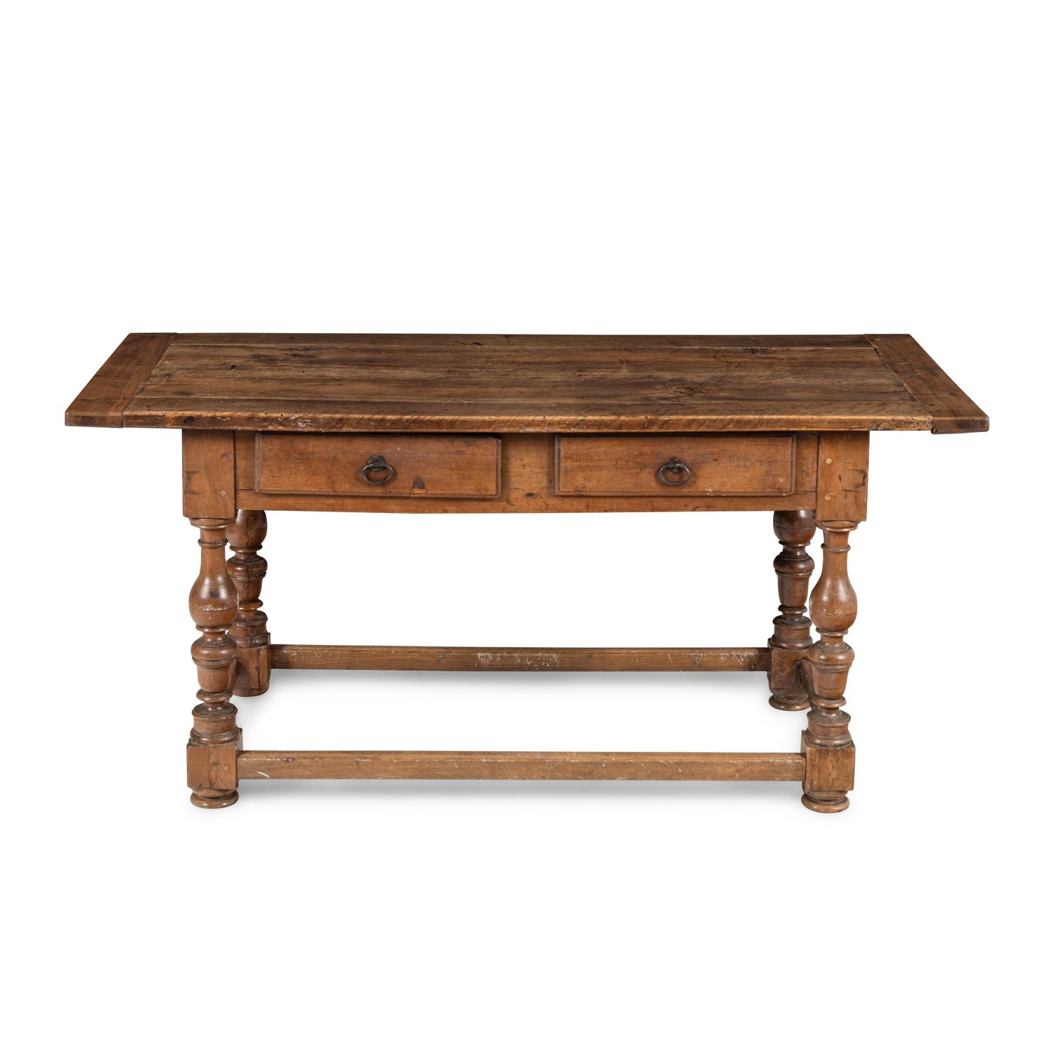 A Continental Baroque Walnut Table