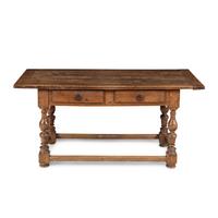 A Continental Baroque Walnut Table