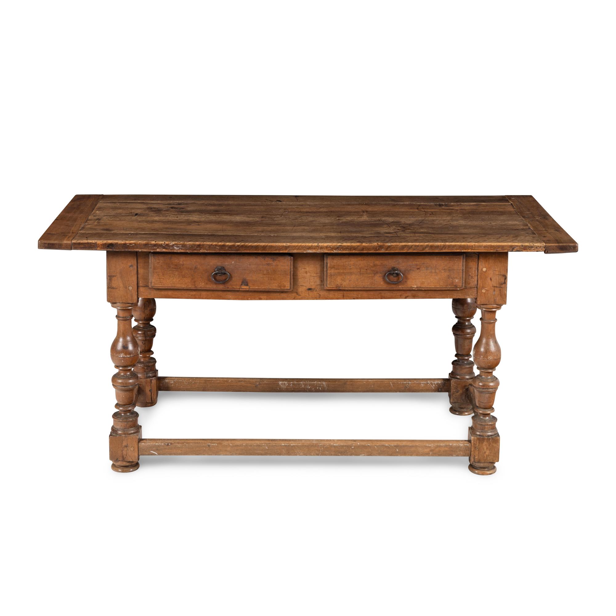 A Continental Baroque Walnut Table
