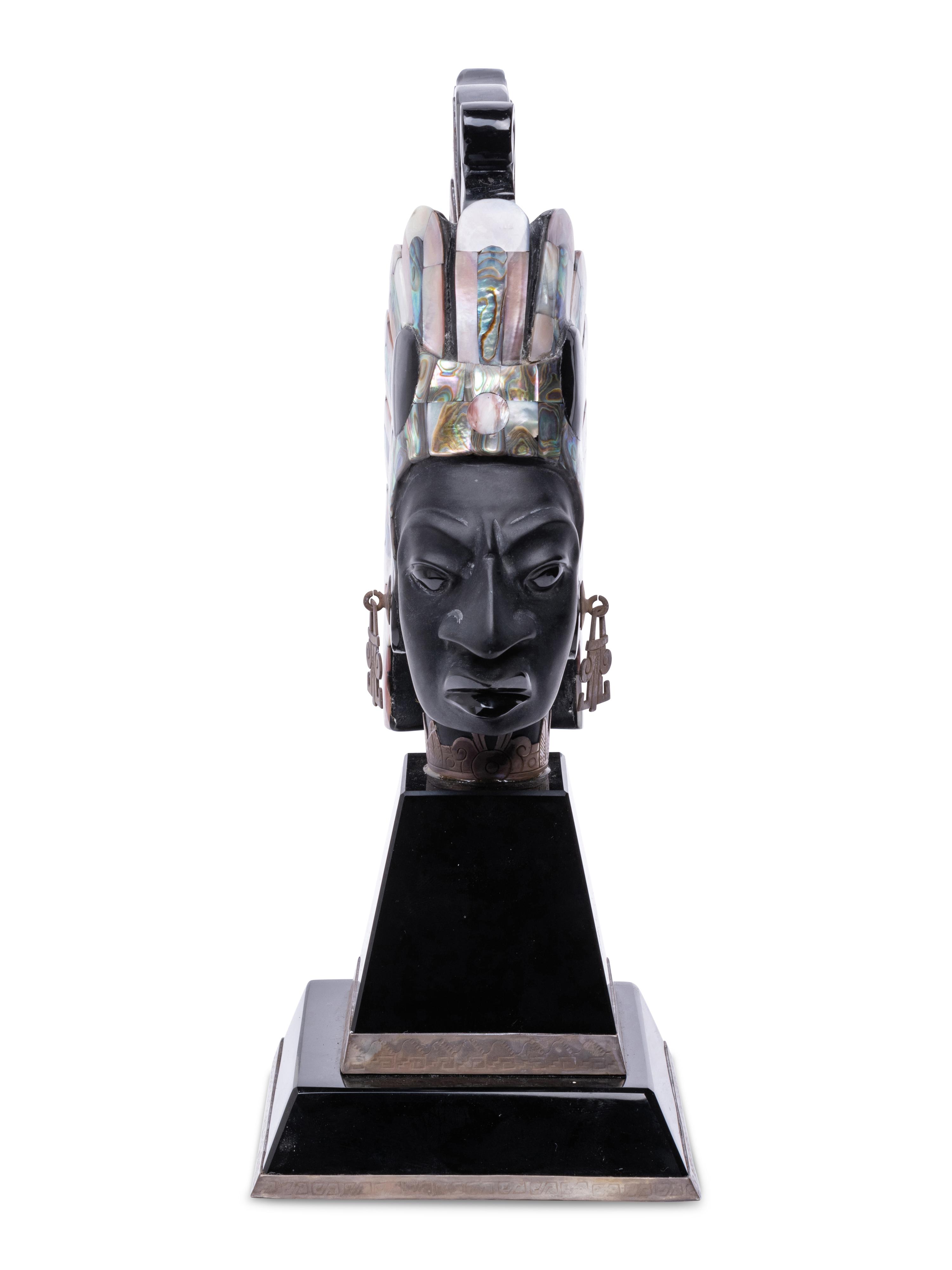 An Onyx and Mother-of-Pearl Bust of an Aztec Deity