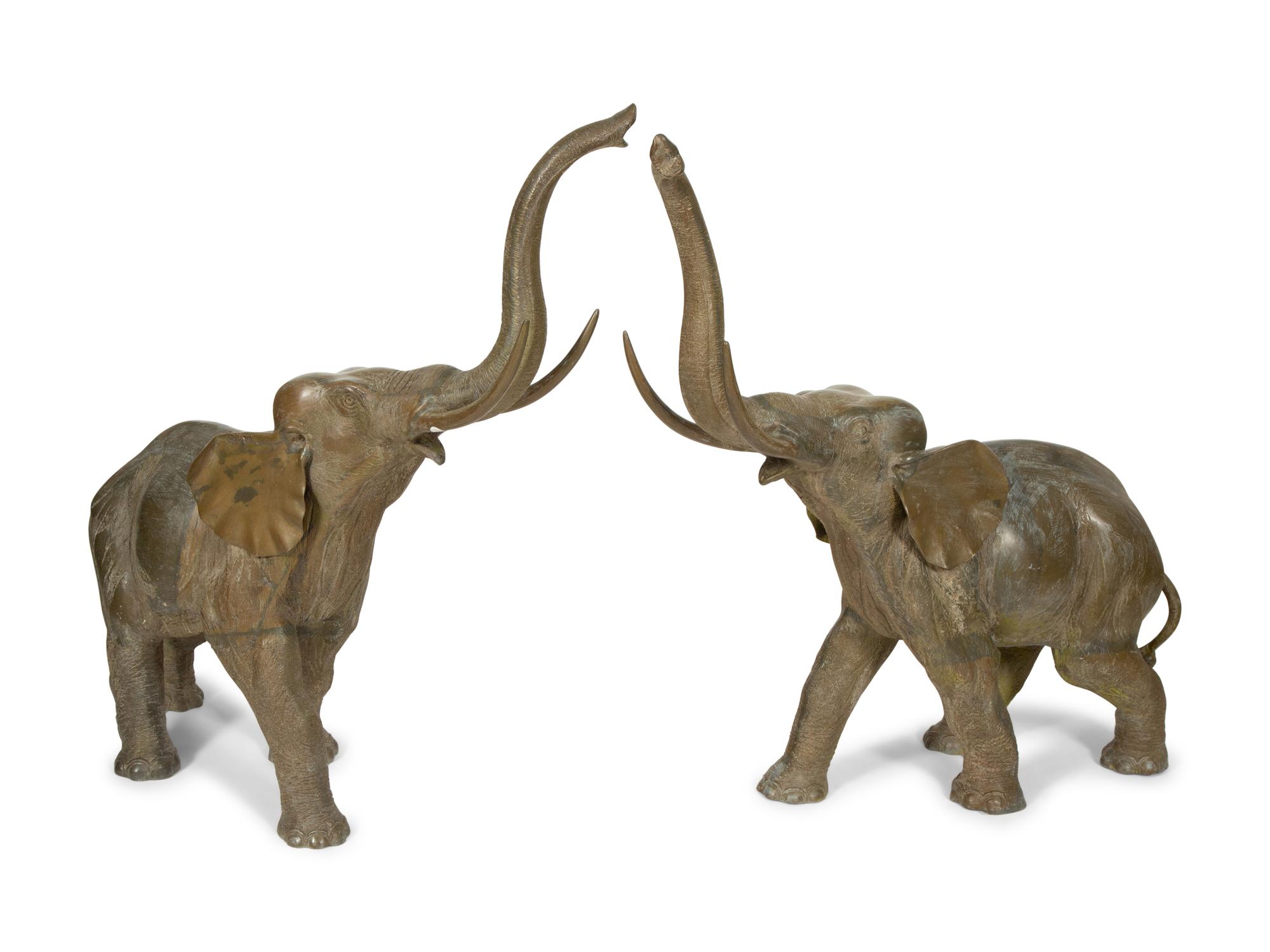 A Pair of Patinated Bronze Elephants