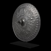 A Victorian Iron Parade Shield with Scenes from the Life of Julius Caesar