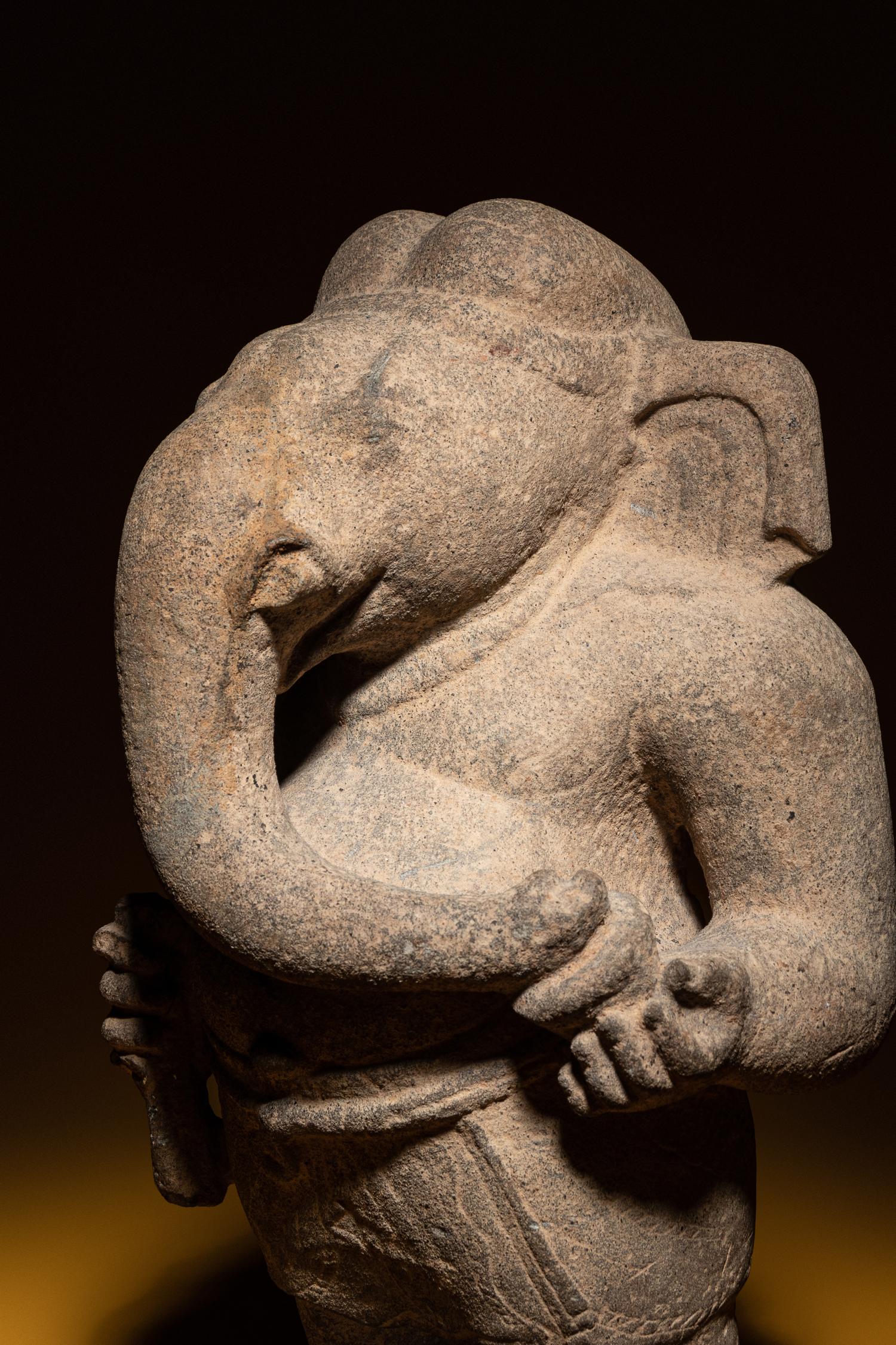 A Rare Khmer Sandstone Figure of Ganesha