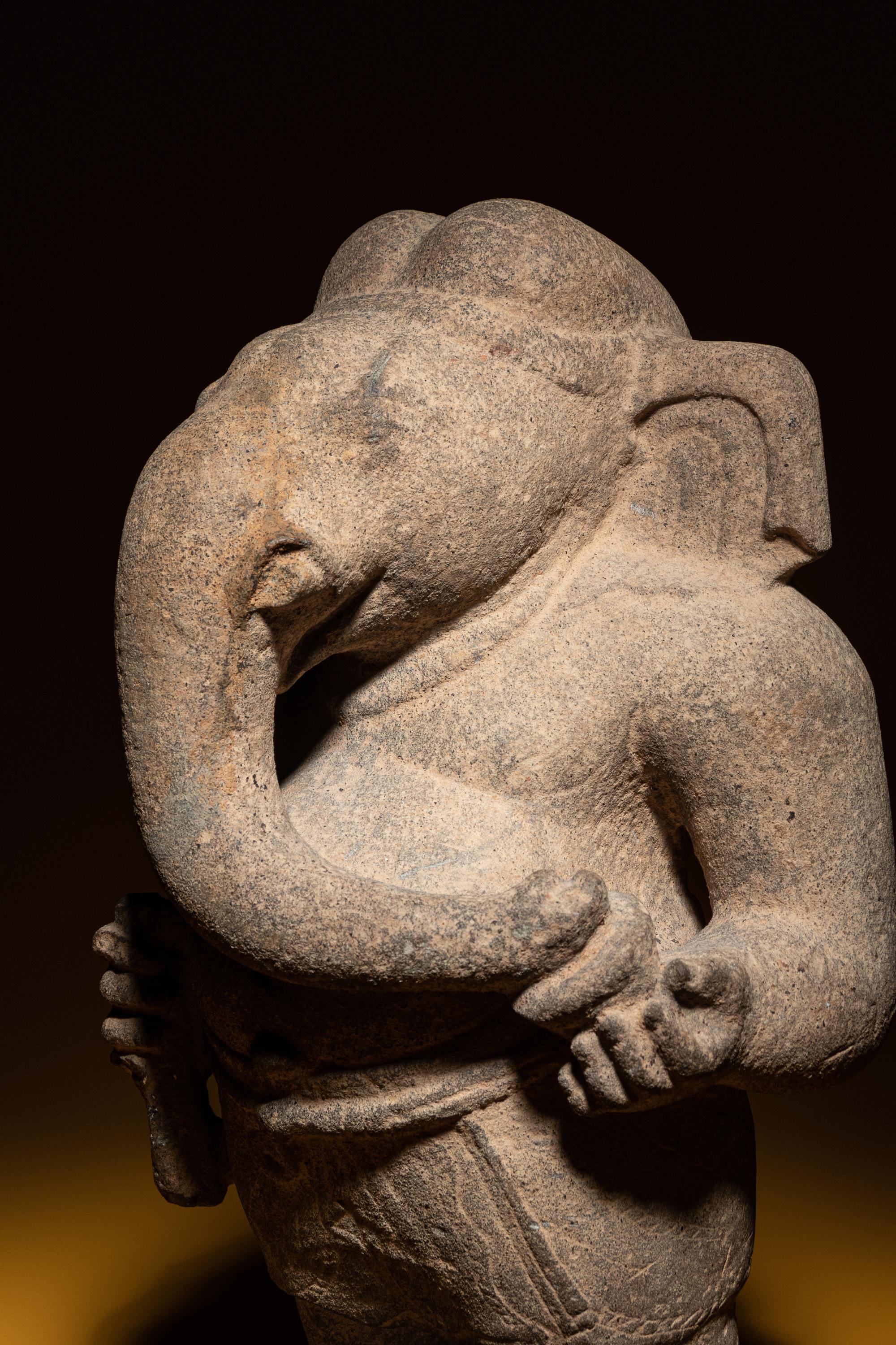 A Rare Khmer Sandstone Figure of Ganesha