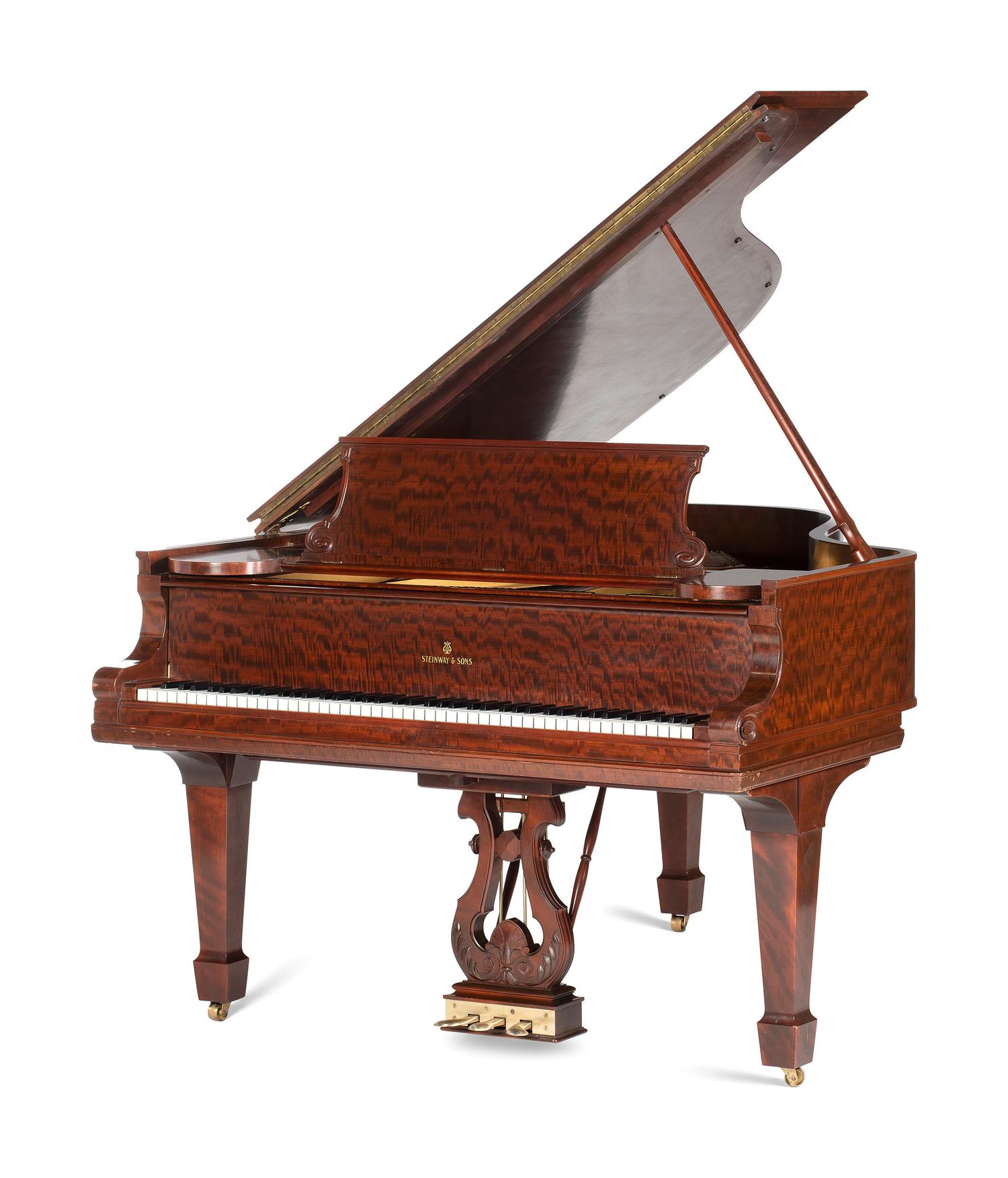 A Steinway and Sons Mahogany Baby Grand Piano