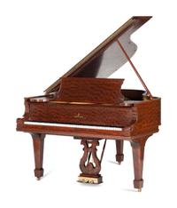 A Steinway and Sons Mahogany Baby Grand Piano