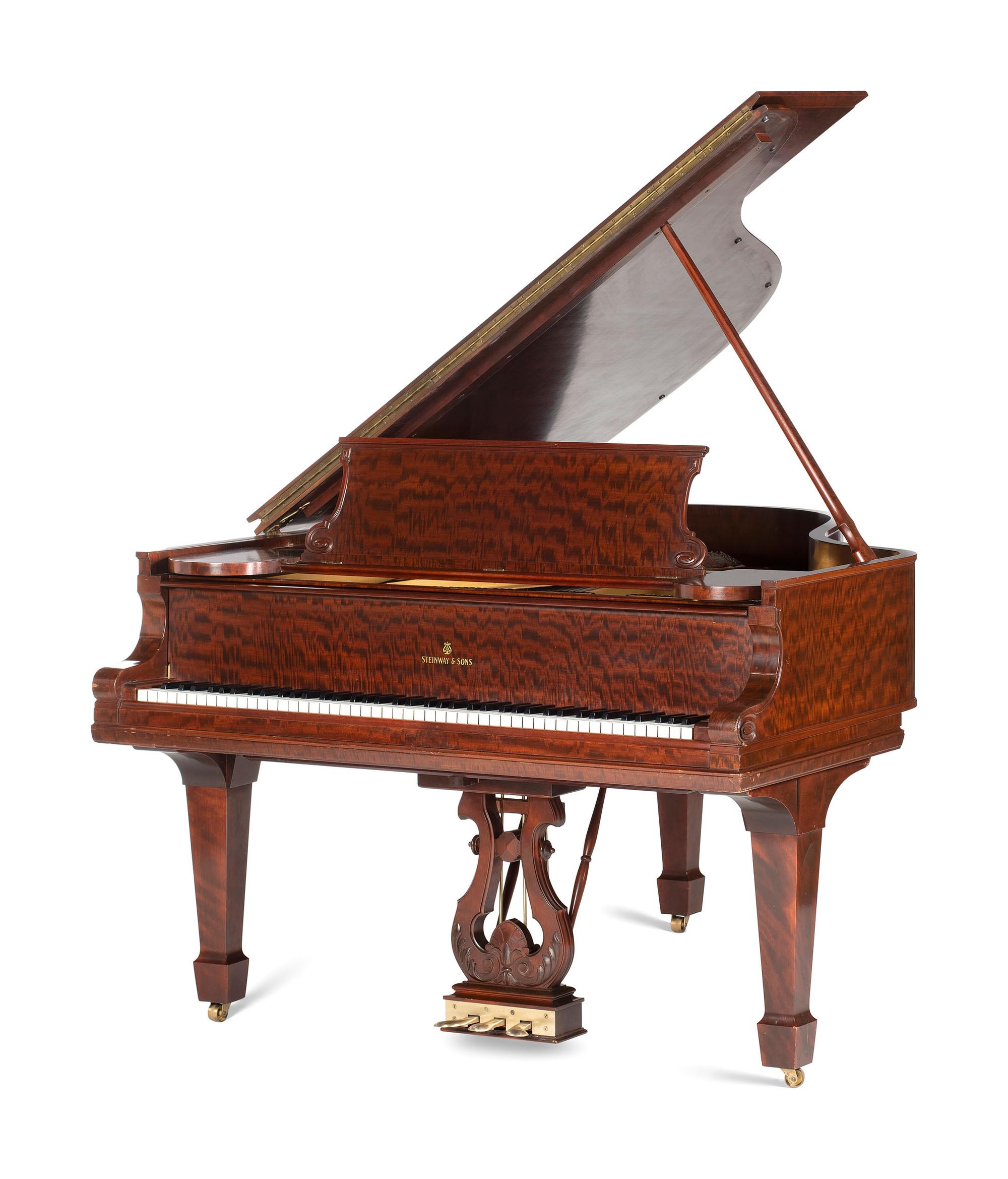 A Steinway and Sons Mahogany Baby Grand Piano