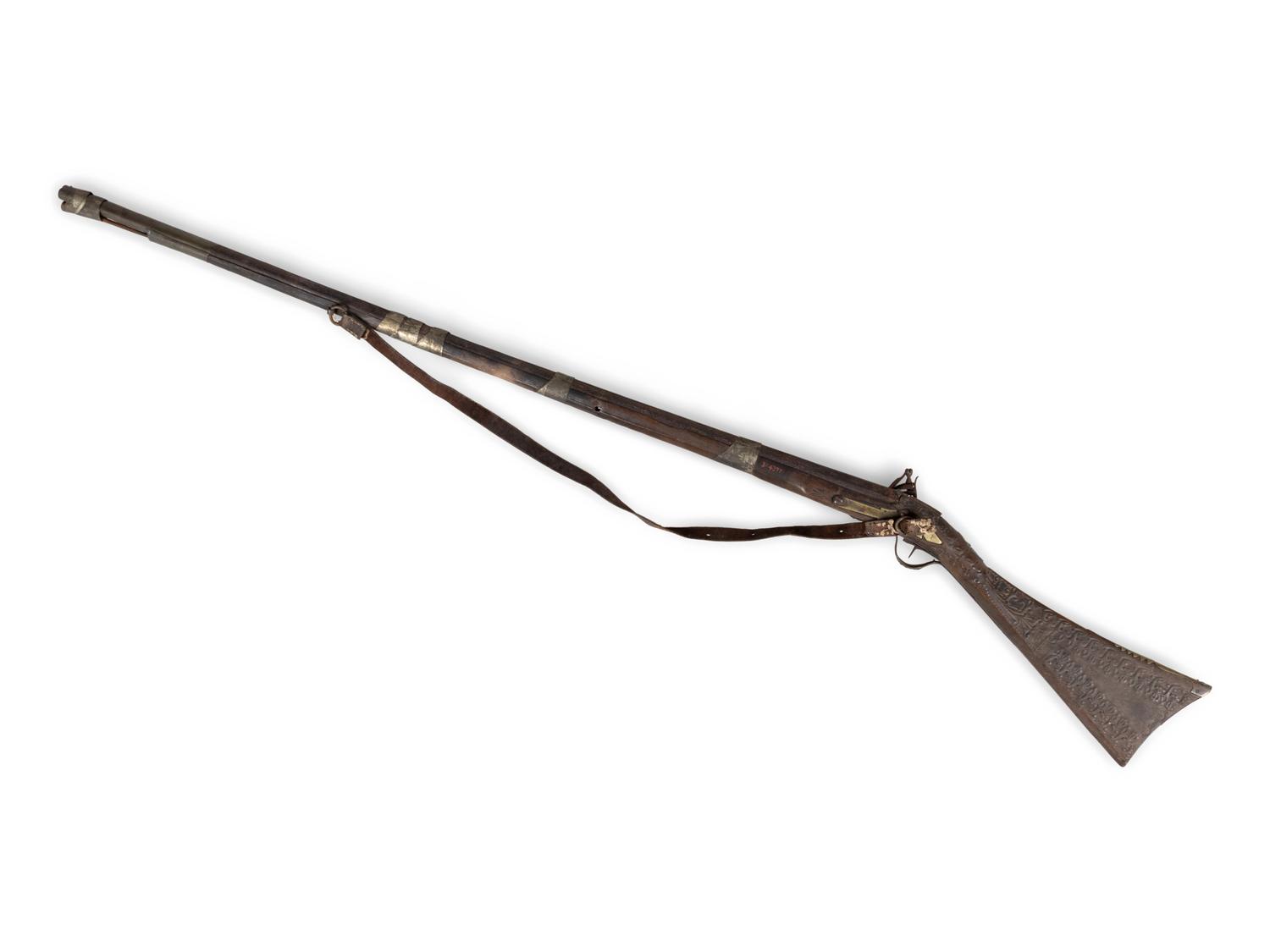 An Egyptian or Near Eastern Metal Inlaid Flintlock Rifle
