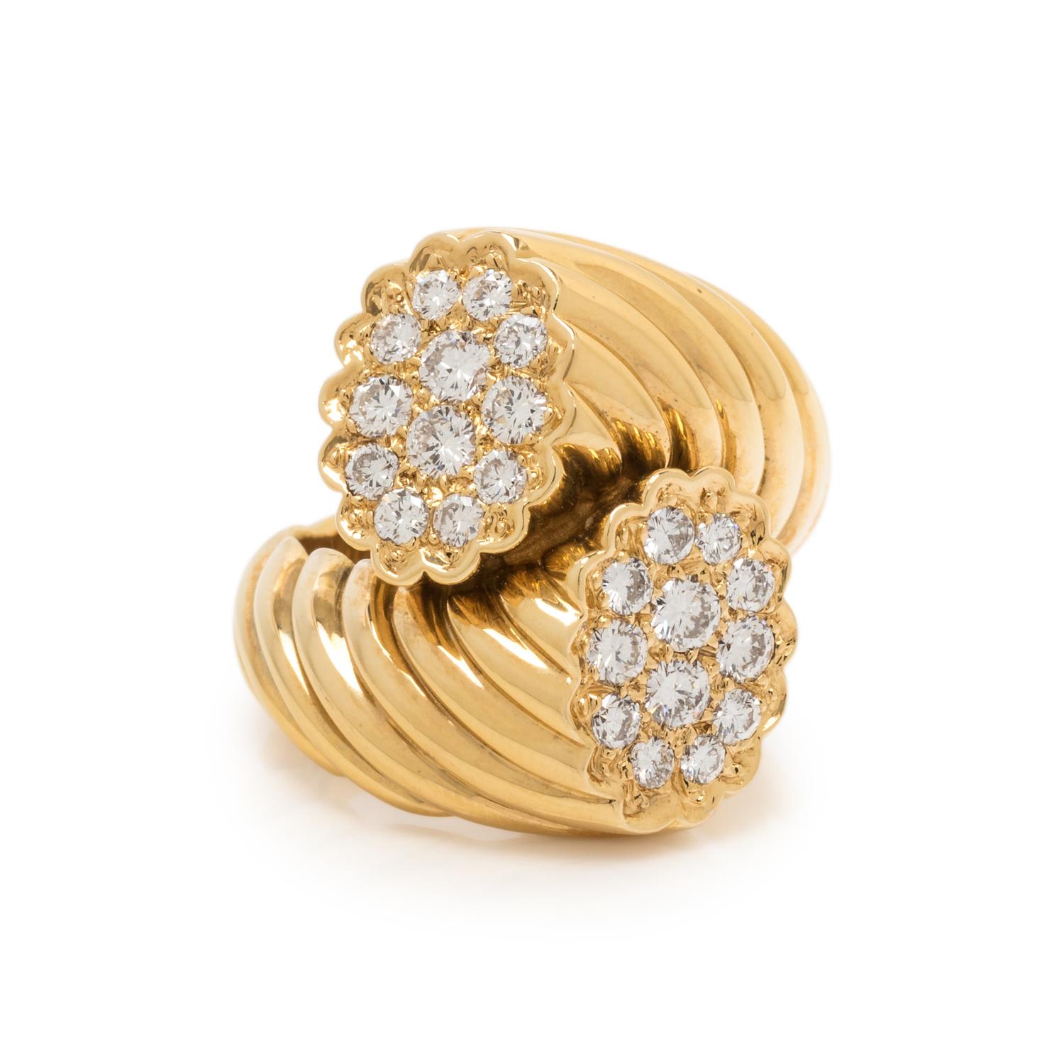 SCHLUGER, YELLOW GOLD AND DIAMOND BYPASS RING