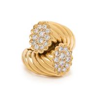 SCHLUGER, YELLOW GOLD AND DIAMOND BYPASS RING