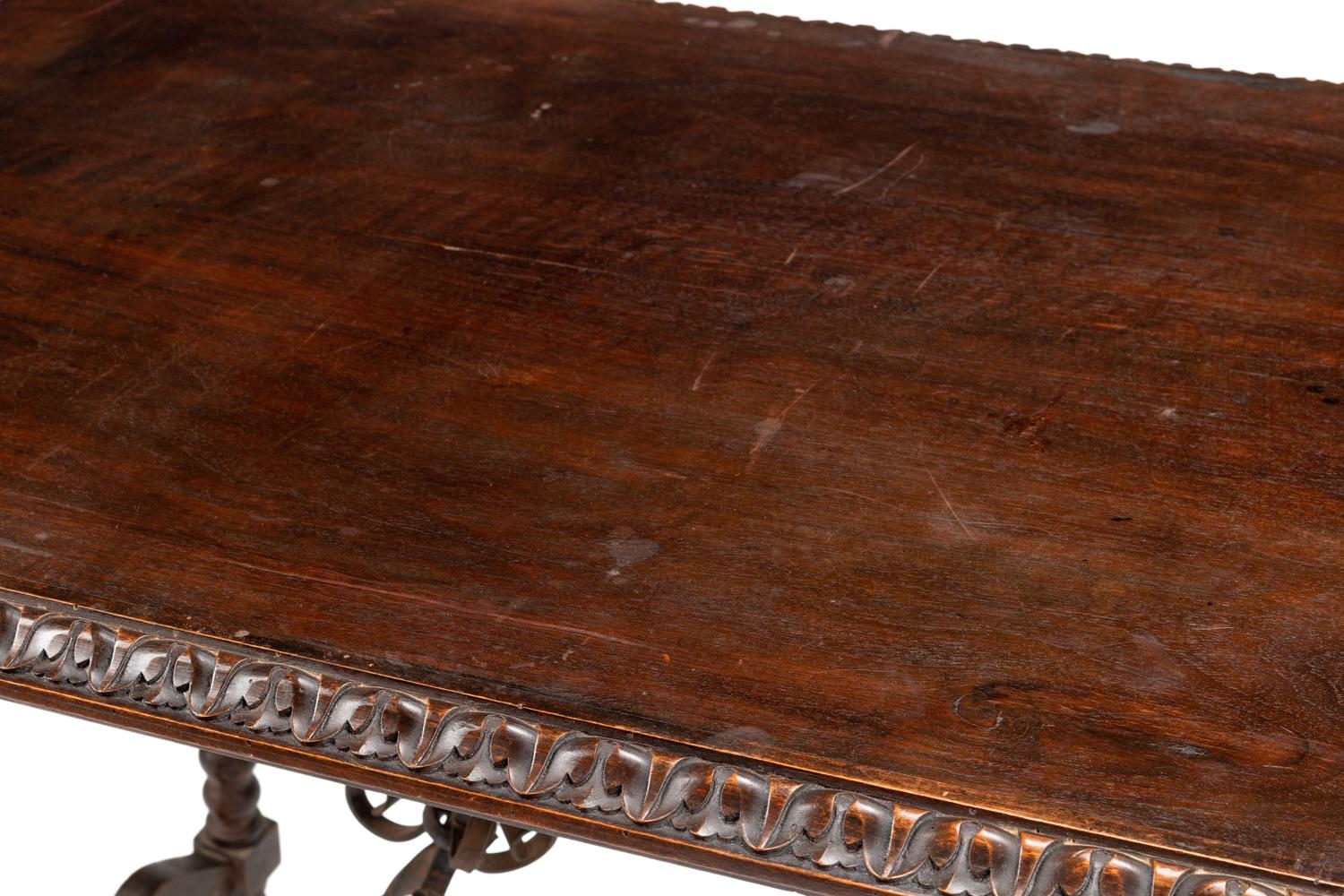 A Renaissance Style Iron Mounted Walnut Table