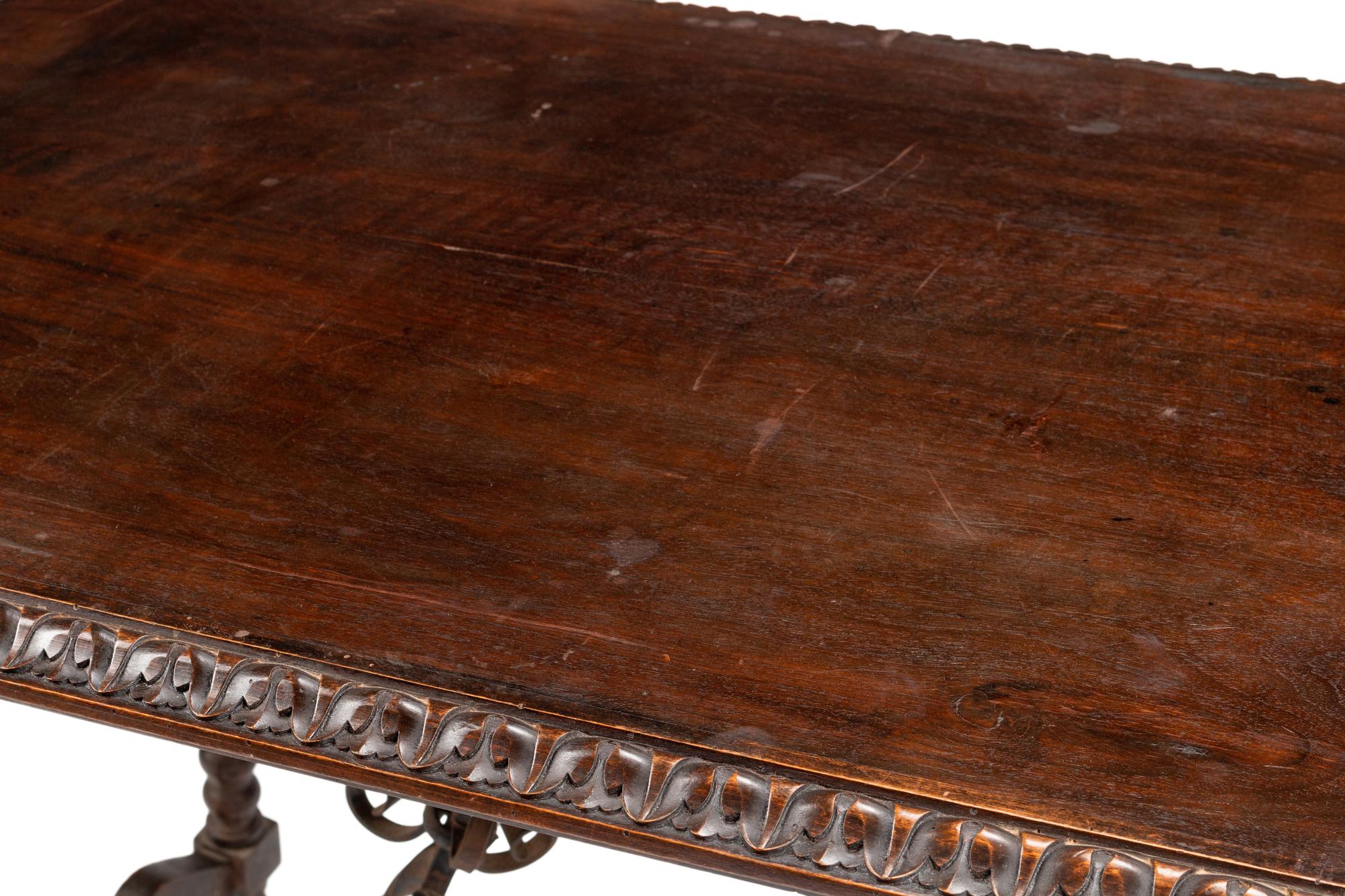 A Renaissance Style Iron Mounted Walnut Table