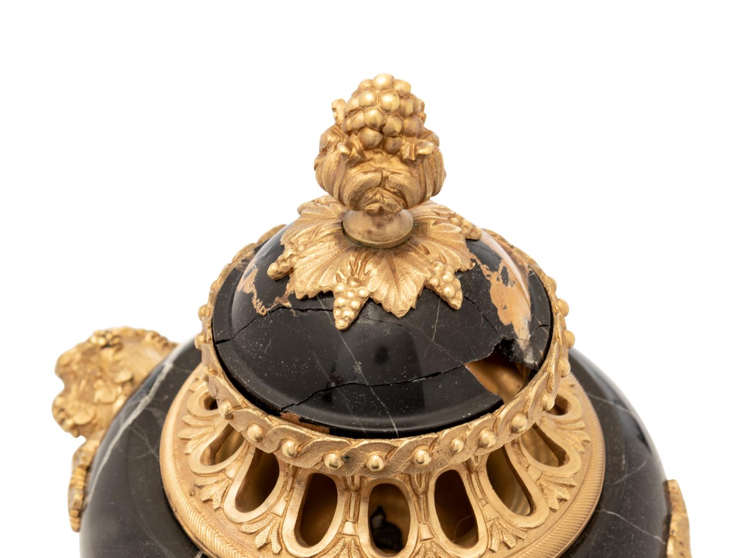 A Pair of Louis XV Style Gilt Bronze Mounted Marble Covered Urns