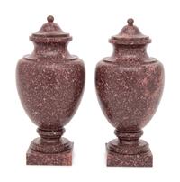 A Pair of Neoclassical Style Carved Porphyry Covered Urns