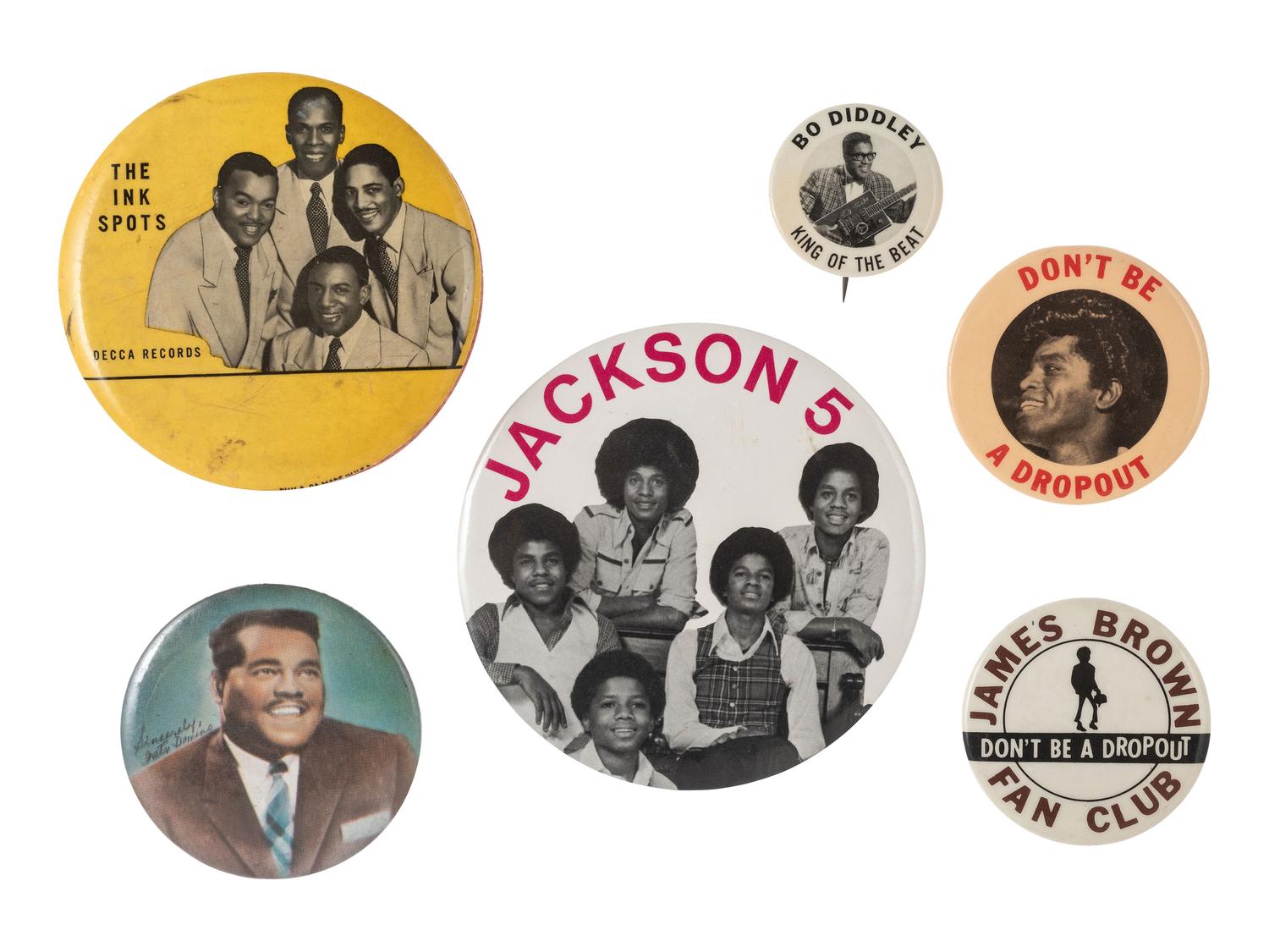 [AFRICAN AMERICANA -- MUSIC]. A group of 6 pinbacks promoting musicians and musical groups incl. James BROWN.