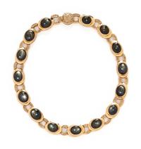 BLACK STAR SAPPHIRE, DIAMOND, AND YELLOW GOLD NECKLACE