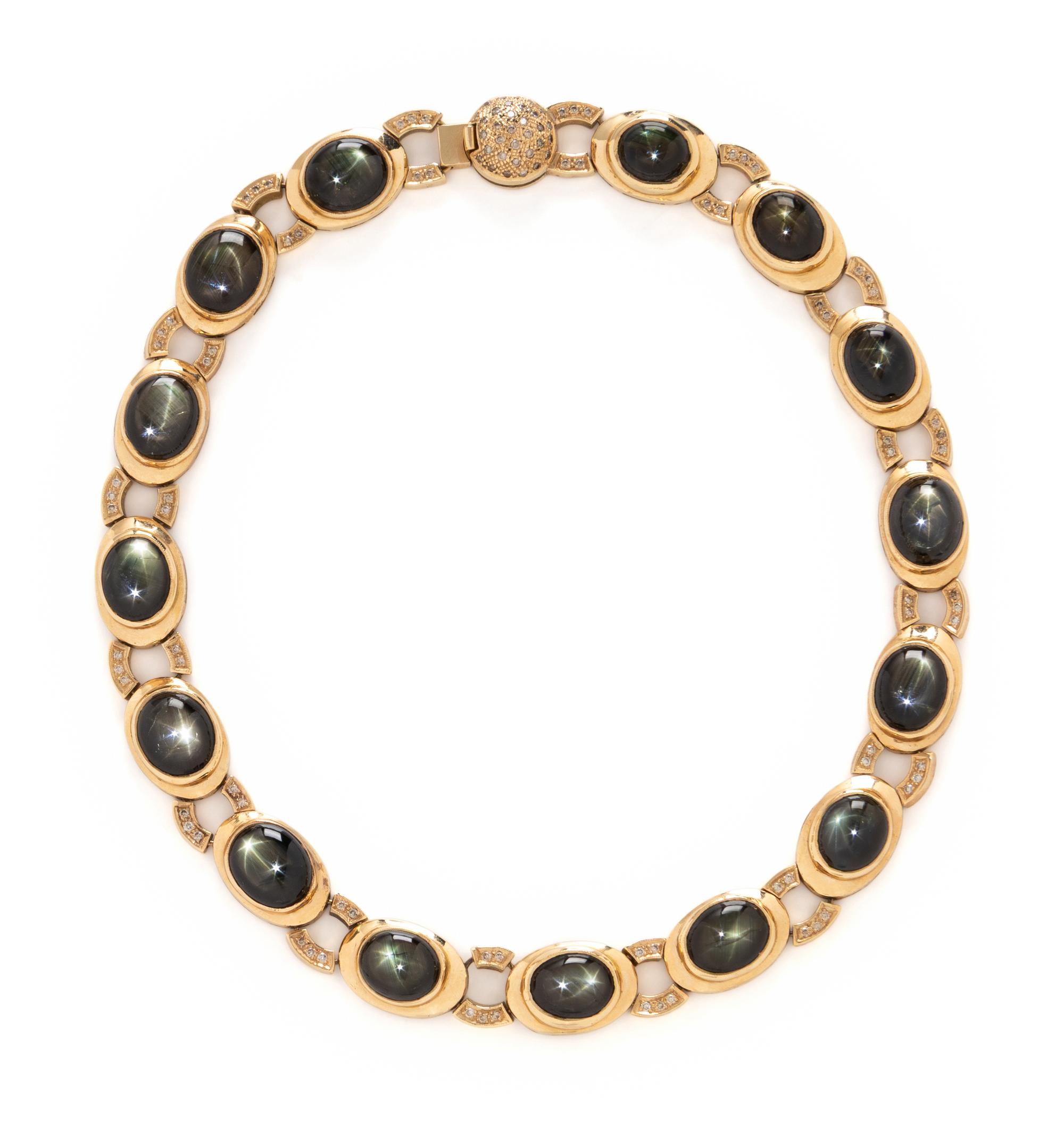 BLACK STAR SAPPHIRE, DIAMOND, AND YELLOW GOLD NECKLACE