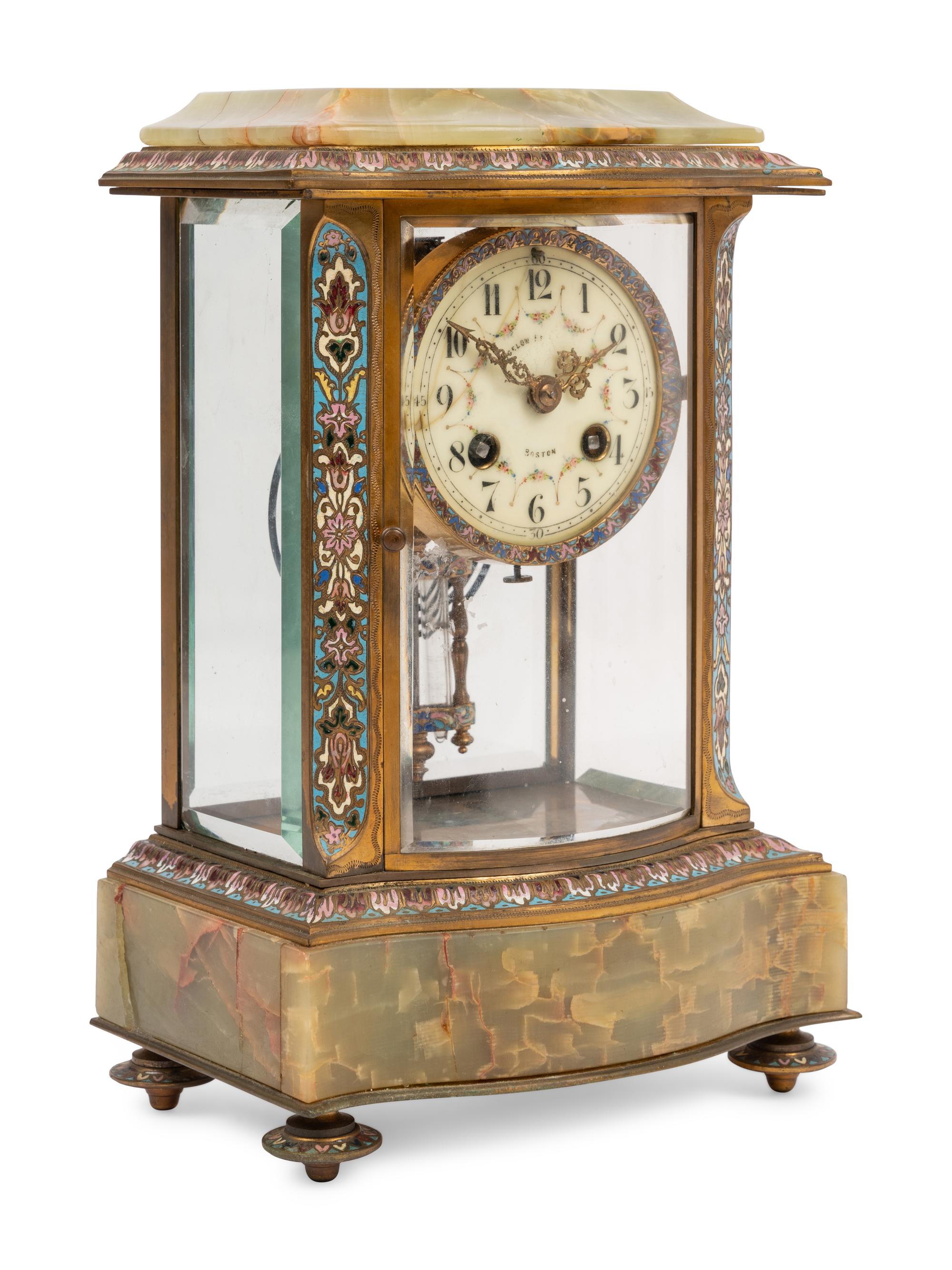 A French Onyx and Champlevé Mantel Clock