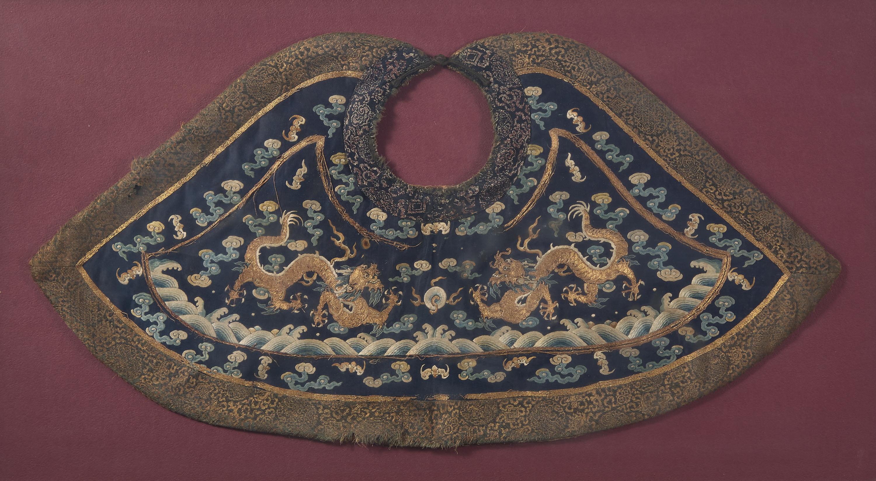 A Chinese 'Dragon' Court Collar, Qing Dynasty 清 石青地綉雙龍戲珠朝服領