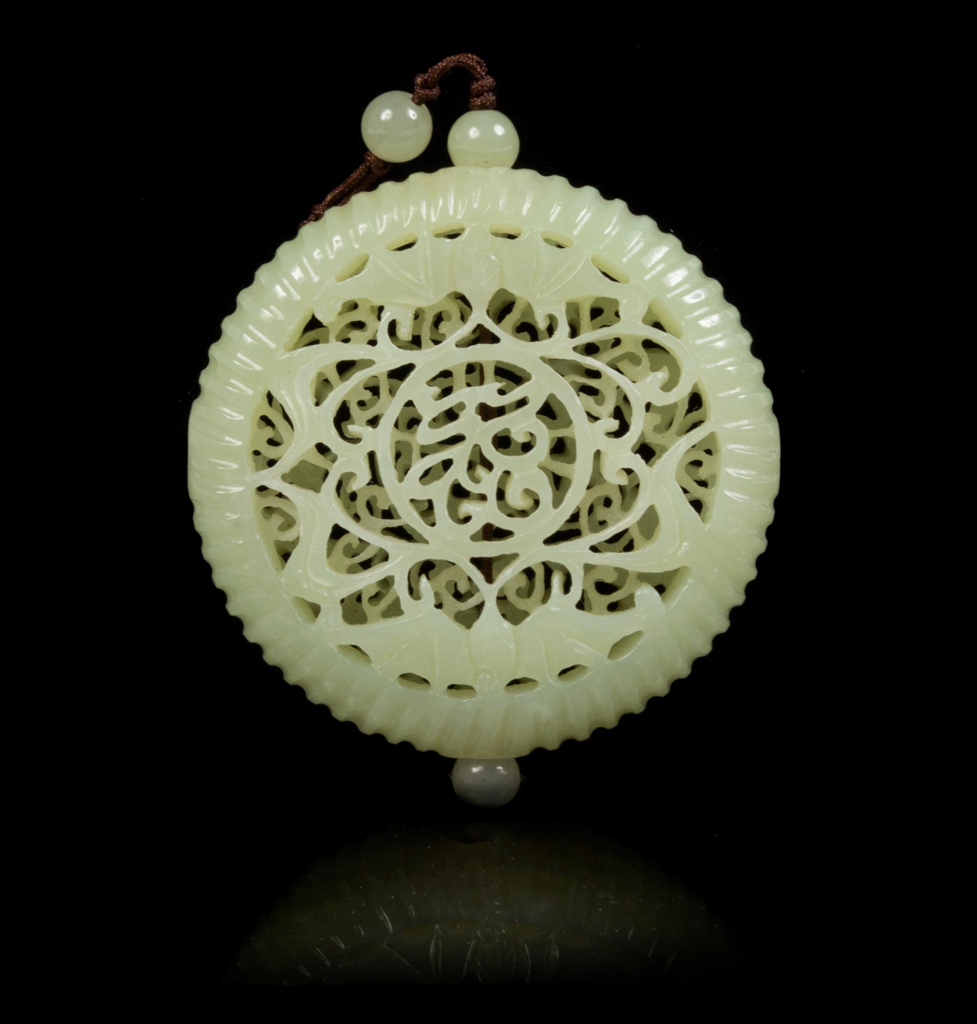 A Pierce Carved Jade Pendant Diameter 2 1/8 inches.