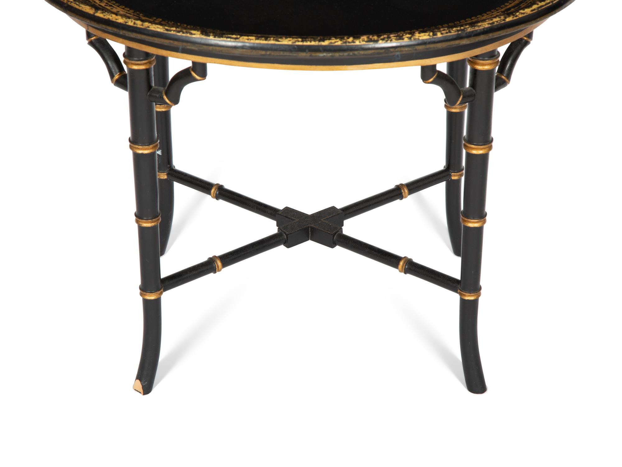 A Regency Style Black and Gilt Decorated Lacquer Tray Top Table