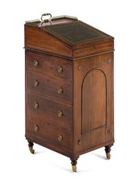 A Regency Brass Mounted and Leather-Inset Mahogany Davenport Desk