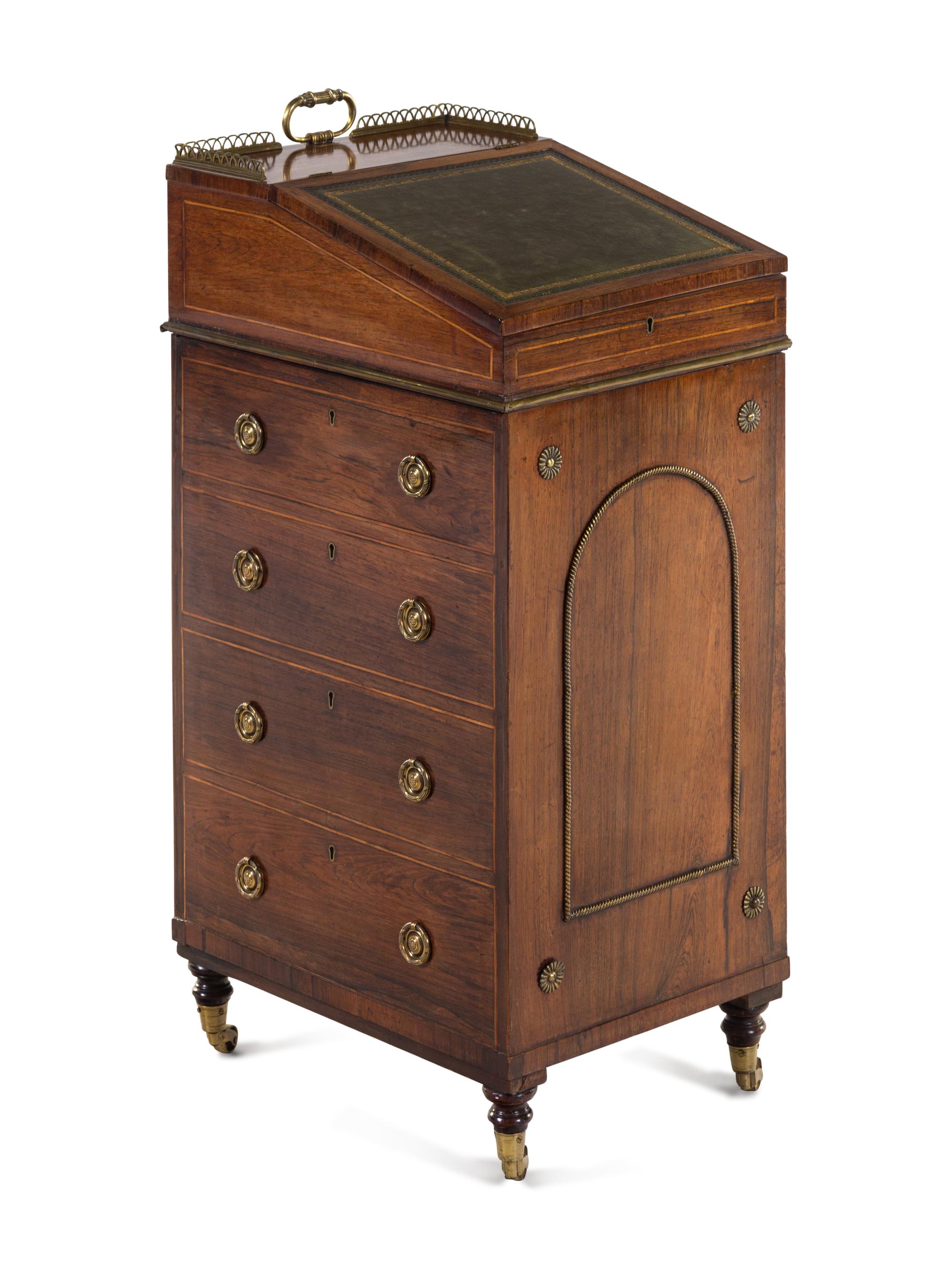 A Regency Brass Mounted and Leather-Inset Mahogany Davenport Desk