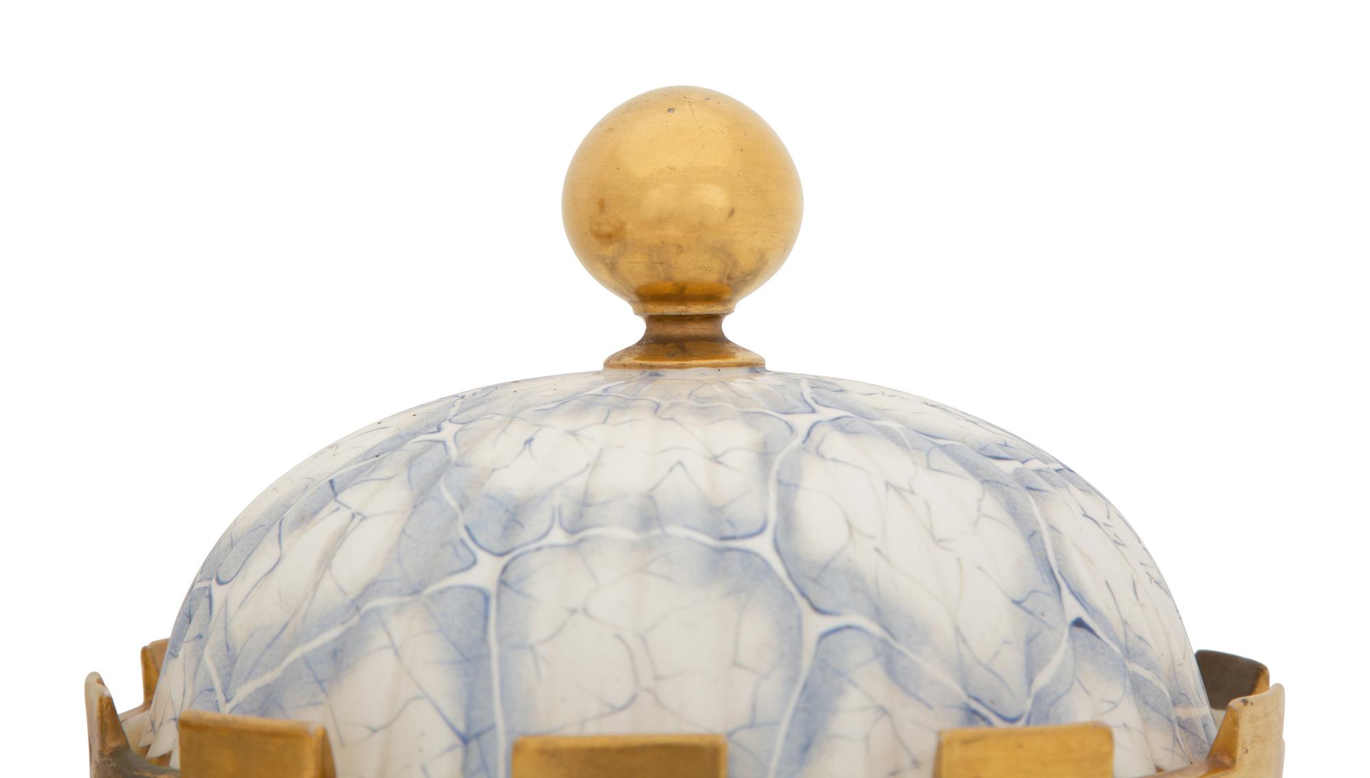 A Pair of English Parcel Gilt Porcelain Fruit Coolers