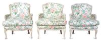 A Group of Three Louis XV Style White-Painted Bergeres Height of first 34 inches. — 20TH CENTURY
