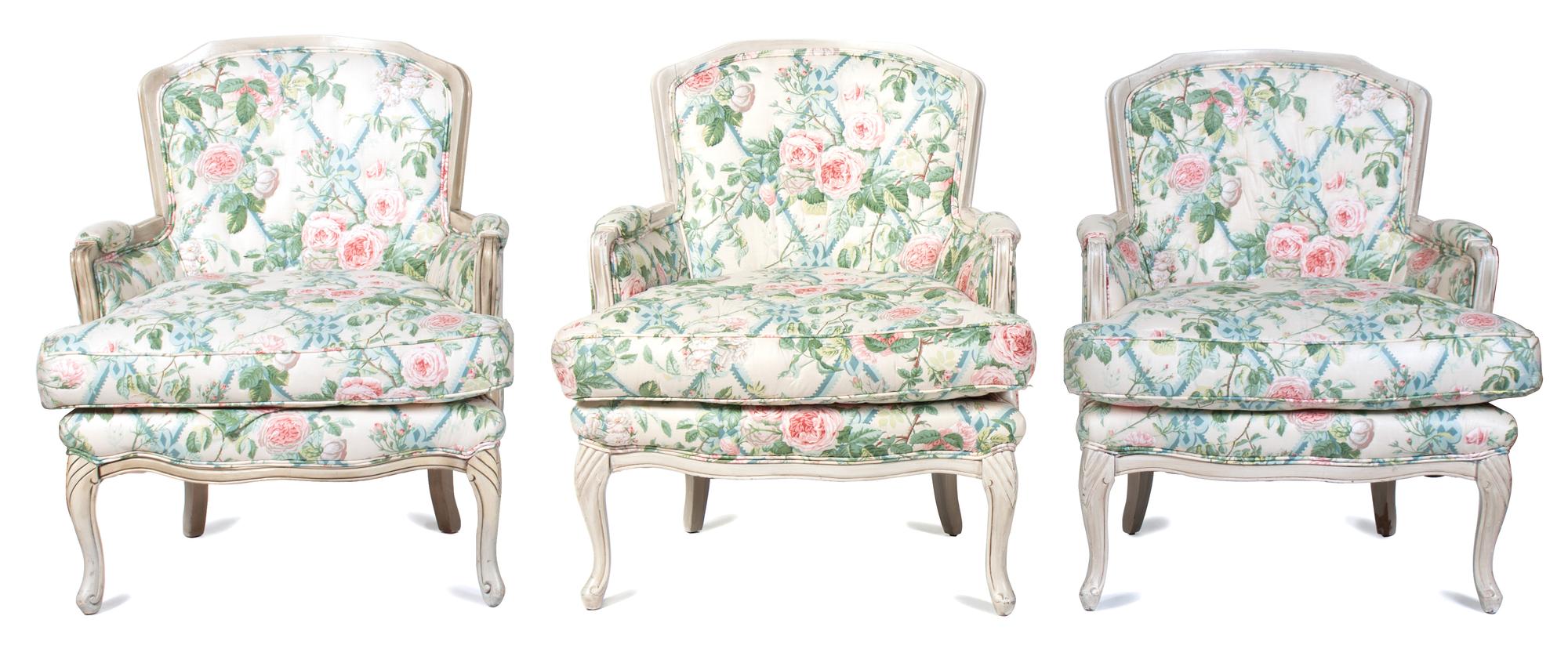 A Group of Three Louis XV Style White-Painted Bergeres Height of first 34 inches. — 20TH CENTURY
