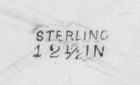 An American Silver Tray, Graff, Washbourne & Dunn, New York, NY, having a foliate swag decorated rim surrounding a pierced floral and f