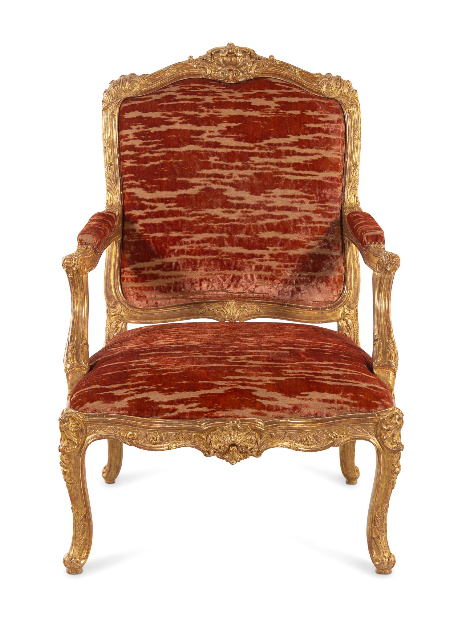 A Louis XV Style Carved Giltwood Fauteuil