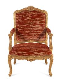 A Louis XV Style Carved Giltwood Fauteuil